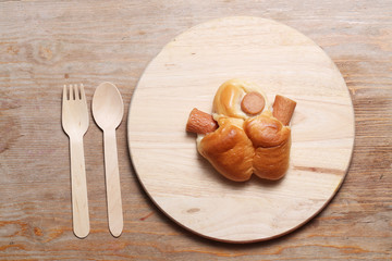 sausage bread on wood background