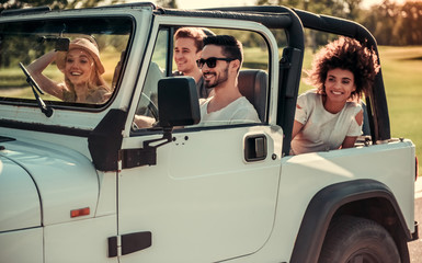 Friends travelling by car