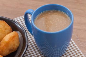 Chinese fried Dough bun with cup of coffee