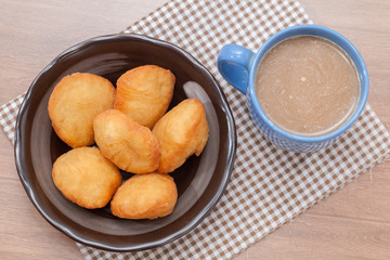 Chinese fried Dough bun with cup of coffee