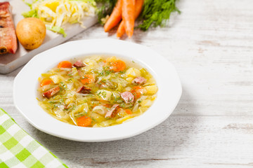 Homemade cabbage soup, cooked on smoked ribs.