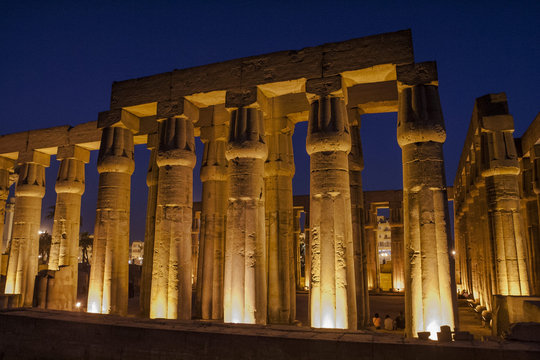 Illuminated Luxor temple at night.