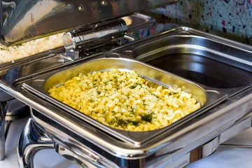 Photo sur Aluminium Plats de repas Chafing dish heaters pasta banquet table