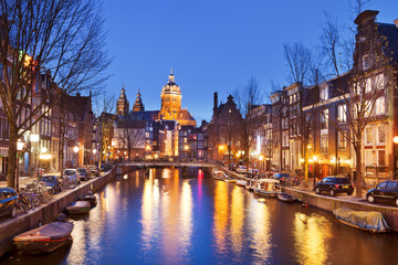 Naklejka na ściany i meble Canal in Amsterdam, The Netherlands by night