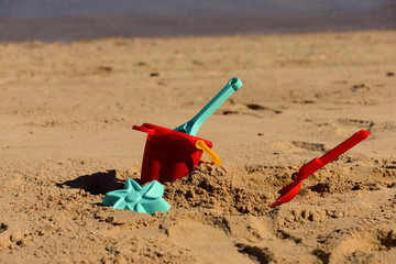 Baby beach toys on the sand on a tropical beach