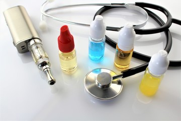 An image of a e-cigarette and a stethoscope - concept