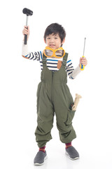 Cute Asian child with construction tools
