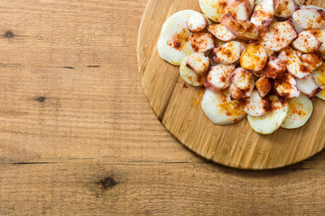 Pulpo a la gallega. Galician octopus on wood. Typical spanish food
