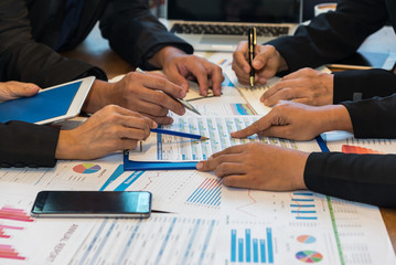 Close up of working process at business meeting,Business partners discussing graph of financial, business concept. Business Concept. select focus.