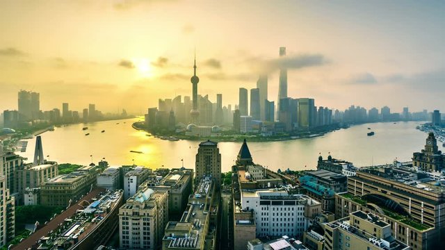 4K(4096x2304): China,Shanghai skyline at sunrise.Aerial view of high-rise buildings with Huangpu River in Shanghai.