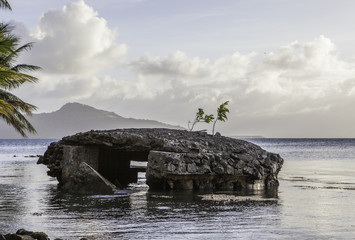 Word war 2 bunker at sunset, Chuuk Laggon beach, Micronesia 