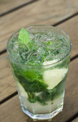Mojito on a wooden table, fresh drink