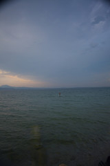man on paddleboard at Gardalake