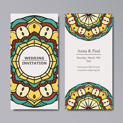 Wedding invitation with floral mandala background and flat color style