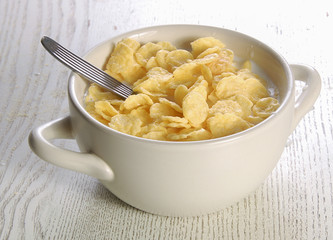Oat flakes with milk in a plate. Healthy lifestyle
