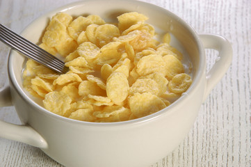Oat flakes with milk in a plate. Healthy lifestyle
