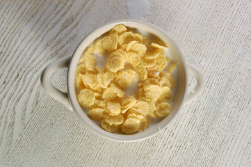 Oat flakes with milk in a plate. Healthy lifestyle
