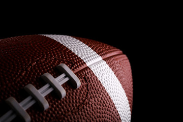 Leather American Football on Black background