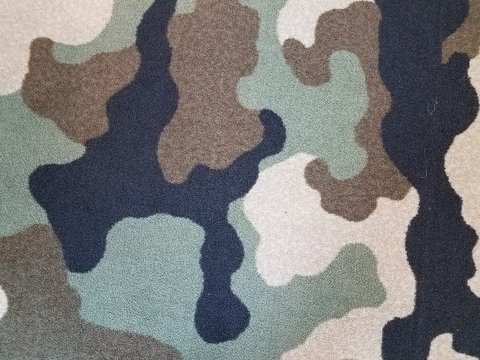 Black, Tan, And Green Camouflage Carpet