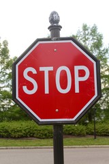 The red stop sign on a close up view.