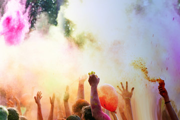 The festival of Indian colors Holi.The time of the throw.Hands