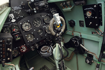 morecambe, england, 02/05/2016, The cockpit and controls inside a world war two spitfire british war plane. Thruster, fuel dials and direction control. - obrazy, fototapety, plakaty