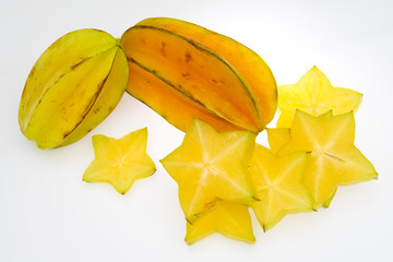 Star fruit on white isolated background translucent delicious natural sweet shape starfruit food texture detail macro close up carambola graphic pattern