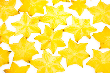 Star fruit on white isolated background translucent delicious natural sweet shape starfruit food texture detail macro close up carambola graphic pattern