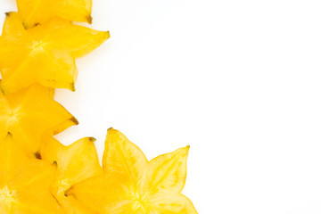 Star fruit on white isolated background translucent delicious natural sweet shape starfruit food texture detail macro close up carambola graphic pattern