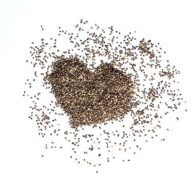 Chia seeds heart-shaped on a white background