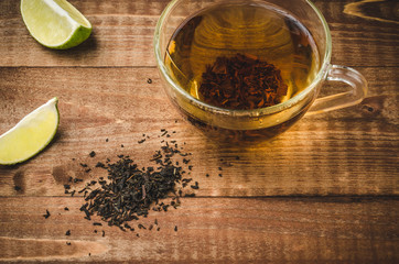 tea on a wooden table with a lime top view/tea on a wooden table with a lime