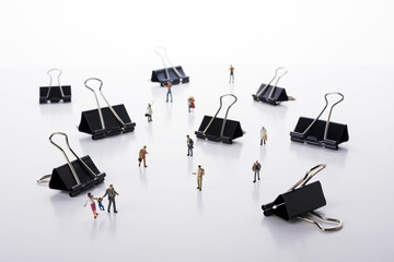 Crowd of people tiny miniature model people and clips in background