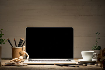 The front view of notebook and cup of coffee. Inspiration and mock-up concept