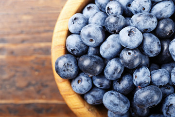Blueberries on a wooden background