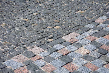 Fototapeta premium The road of stones. Abstract background. Texture of an old stone road.
