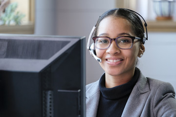 Portrait of a black female customer service representative