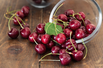 Sweet cherries scattered on the table