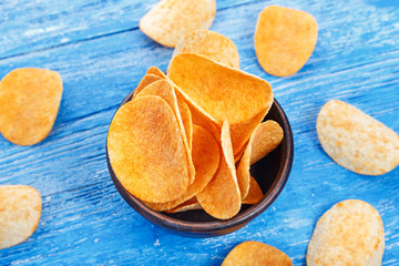 Crispy potato chips top view.