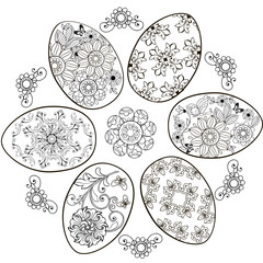 Set of Easter eggs and design elements. Monochrome hand drawings for coloring antistress