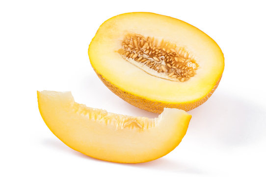 Slice of ripe yellow melon, on white