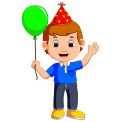 boy holding balloons