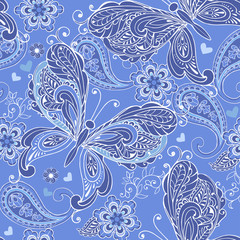 Cute seamless pattern with decorative butterflies and hearts and paisley in blue. Vintage flowers seamless ornament in blue colors. Decorative ornament backdrop for fabric, textile, wrapping paper