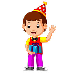 boy holding birthday gifts
