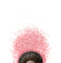 Brush kabuki close-up with pink blush or highlighter isolated on white