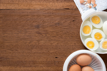 Eggs boiled on wooden table.