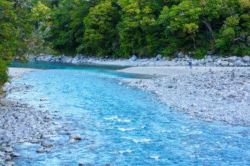 The beautiful Makarora River where the water is really blue at the Blue pools walking track in Mount Aspiring National Park, Wanaka , South Island of New Zealand