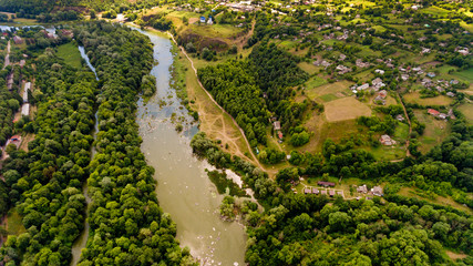 Fototapeta na wymiar Aerial view of river in village.