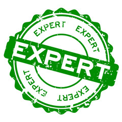 Grunge green expert round rubber seal stamp on white background