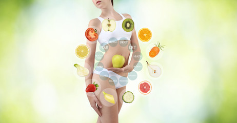 woman with fruits and vegetables, diet body care concept, isolated on blurred green background