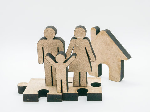Wood carving family on a white background.